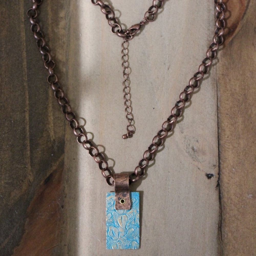 Blue/Gold Embossed Leaves Pendant Necklace.